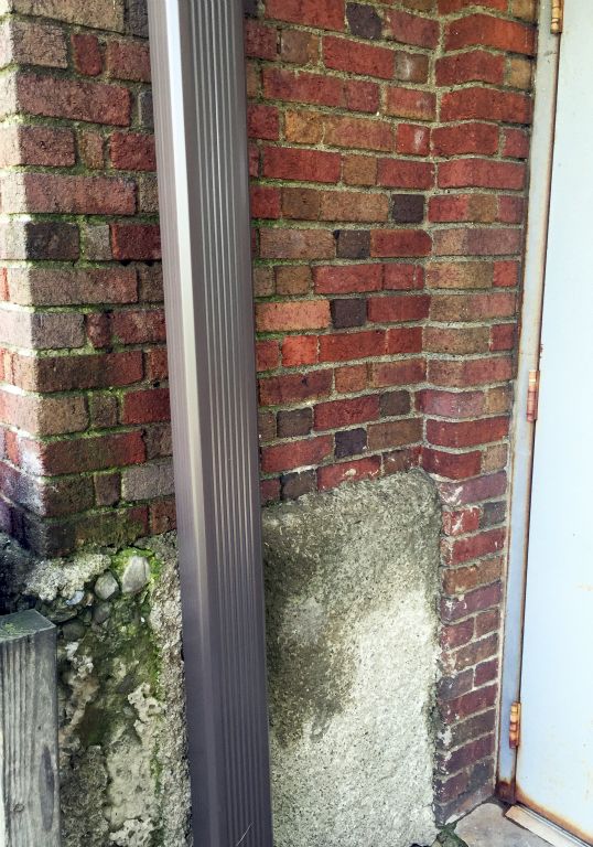 downspout behind back door